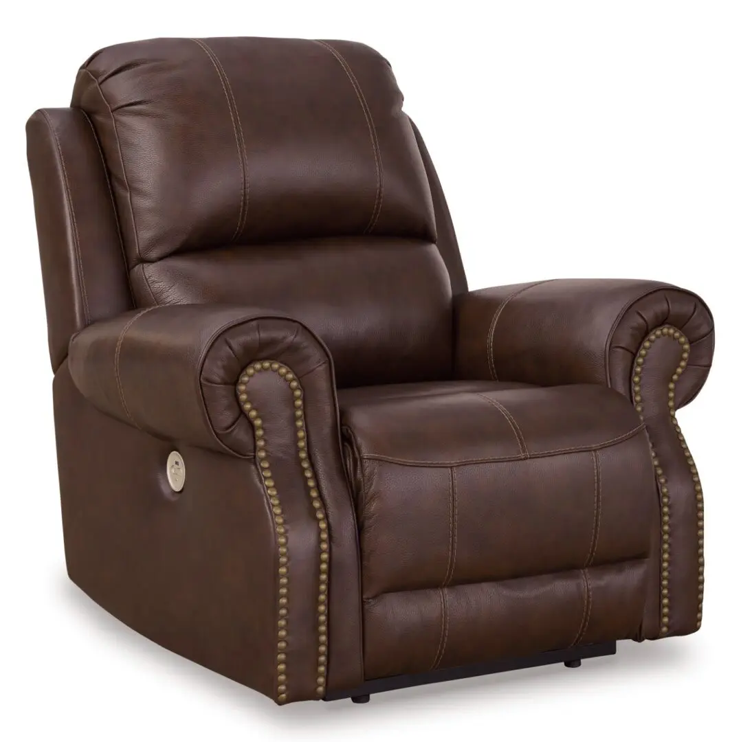 A brown leather recliner with nailhead trim.