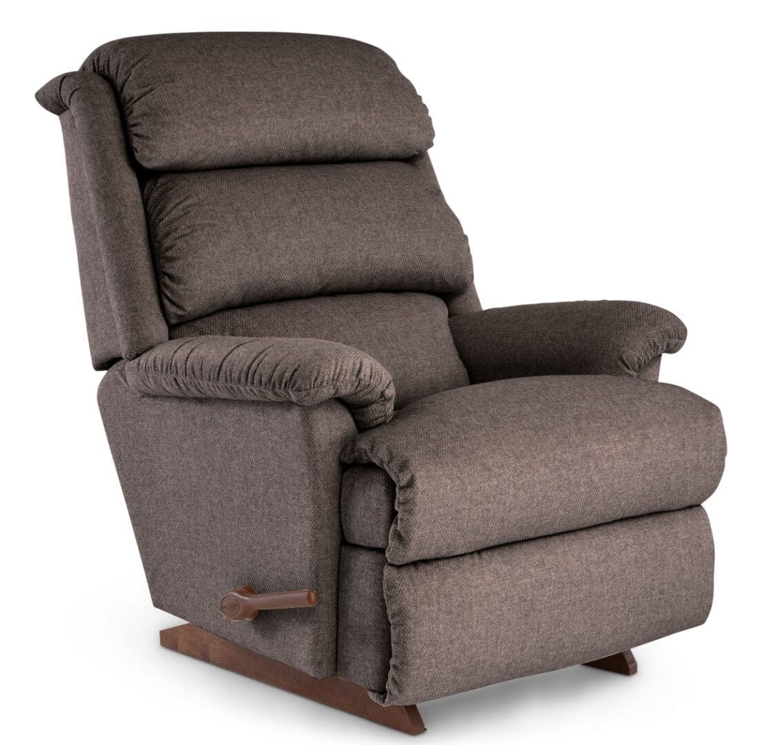 A recliner that is in the middle of a room.