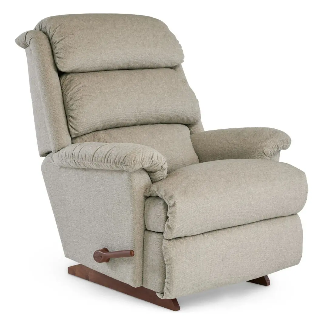 A white recliner with a wooden arm rest.